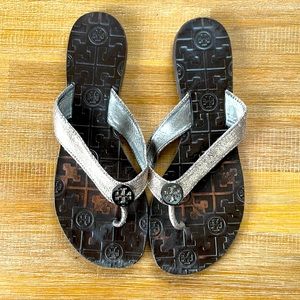 Tory Burch leather flip flops.